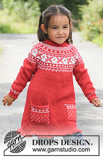Selina / DROPS Children 22-20 - Stickad tunika i DROPS Karisma stickad uppifrån och ner med runt ok och norskt mönster. Till barn stl 3 – 12 år
