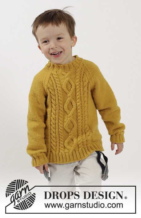 Lucky Jack / DROPS Children 26-3 - Pull tricoté en DROPS Merino Extra Fine avec emmanchures raglan et torsades. Pour enfant du 2 au 10 ans