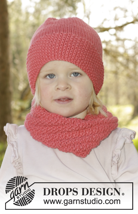 Papaya Punch / DROPS Children 27-14 - Set of knitted neck warmer and hat with seed st in DROPS Nepal. Size children 1 - 10 years
