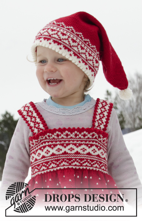 Miss Cookie / DROPS Children 32-2 - Knitted dress for babies and children in DROPS BabyMerino. The piece is worked top down with Nordic pattern. Sizes 6 months – 6 years.