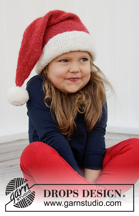 Sleepy Santa Hat / DROPS Children 32-21 - Cappello di Babbo Natale per bambini in DROPS Air. Lavorato a maglia rasata e coste. Taglie 3 – 12 anni. Tema: Natale.
