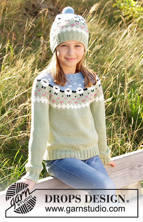 Lamb Dance Sweater / DROPS Children 34-3 - Knitted sweater for kids in DROPS Merino Extra Fine or DROPS Lima. Piece is knitted top down with sheep, color pattern, ribs and stockinette stitch. Size 3-12 years