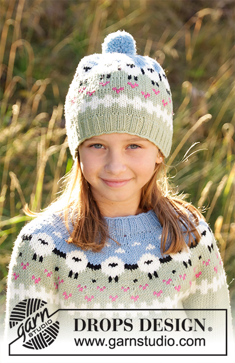 Lamb Dance Sweater / DROPS Children 34-3 - Knitted jumper for kids in DROPS Merino Extra Fine or DROPS Lima. Piece is knitted top down with sheep, colour pattern, ribs and stocking stitch. Size 3-12 years