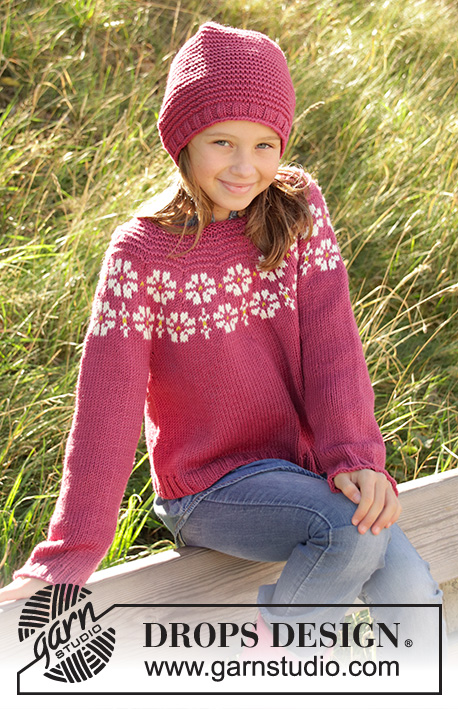 Daisy Delight / DROPS Children 34-7 - Knitted jumper for children in DROPS Merino Extra Fine, DROPS Lima and DROPS Cotton Light. The piece is worked top down with flowers, coloured pattern, garter stitch and stocking stitch. Sizes 3-12 years.
