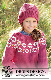 Daisy Delight / DROPS Children 34-7 - Strikket genser til barn i DROPS Merino Extra Fine, DROPS Lima eller DROPS Cotton Light. Arbeidet er strikket ovenfra og ned med blomst, fargemønster, riller og glattstrikk. Størrelse 3-12 år.