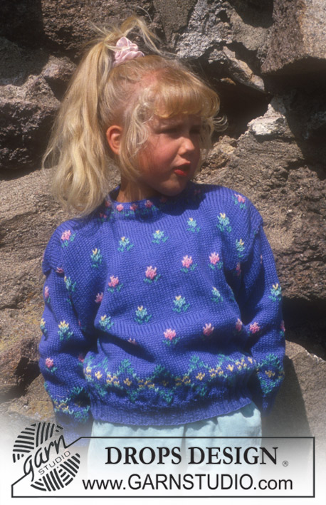 Daniela / DROPS Children 4-1 - Sweater in Karisma with rosebuds.