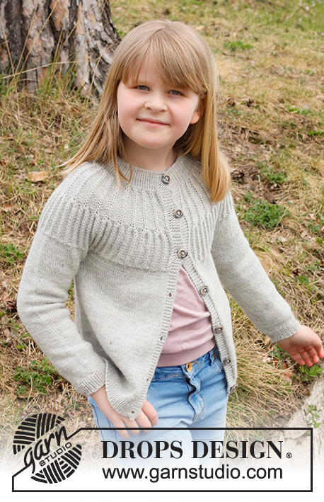 Hermine Jacket / DROPS Children 41-13 - Knitted jacket for children in DROPS Alpaca. The piece is worked top down, with round yoke, textured pattern and Fisherman’s rib on the yoke. Sizes 2 to 12 years.