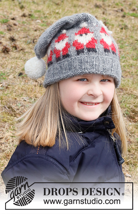 Merry Santas Hat / DROPS Children 41-18 - Gestrickte Mütze für Kinder in DROPS Air. Die Arbeit wird mit Weihnachtswichteln und Pompon gestrickt. Größe 3 – 14 Jahre. Thema: Weihnachten.