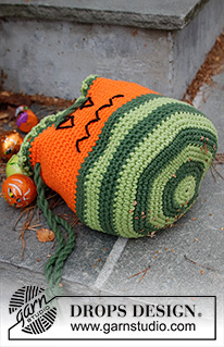 Scary Pumpkin Bag / DROPS Children 44-11 - Virkattu kurpitsa-aiheinen makeispussi / laukku DROPS Paris-langasta. Työ virkataan suljettuna virkkauksena. Työssä on raitoja ja kirjotut kasvot. Teema: Halloween.