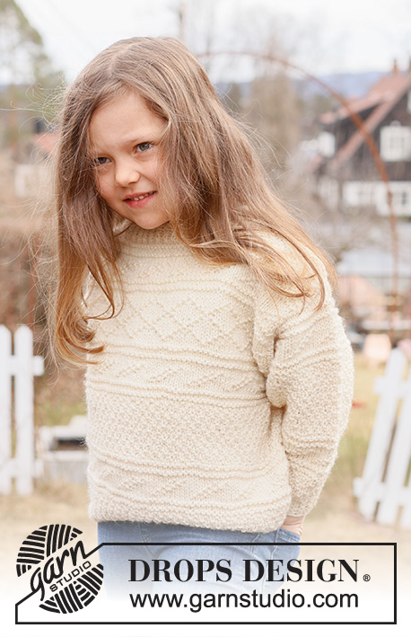 Icing on the Cake / DROPS Children 44-13 - Strikket genser til barn i DROPS Alaska med relieffmønster og perlestrikk. Arbeidet strikkes nedenfra og opp med dobbel halskant. Størrelse 2 – 12 år.