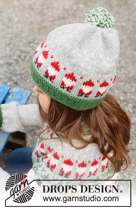 Santa Time Hat / DROPS Children 44-15 - Strikket hue til børn i DROPS Karisma. Arbejdet strikkes nedefra og op i flerfarvet mønster med nisse. Størrelse 2 – 14 år. Tema: Jul.
