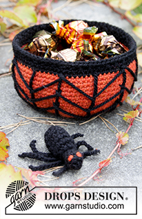 Creepy Candy / DROPS Extra 0-1171 - DROPS Halloween: Crochet pumpkin basket with cob web and spider in DROPS Nepal.