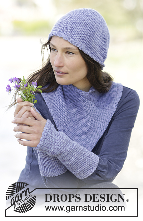 Purple Wish / DROPS Extra 0-1185 - Knitted DROPS hat, neck warmer and wrist warmers in garter st with cables in ”BabyAlpaca Silk”.