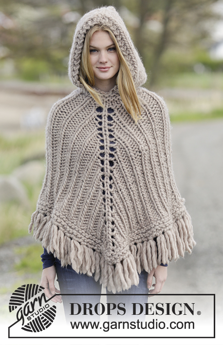 Earthling / DROPS Extra 0-1221 - Knitted DROPS poncho with hood and fringes, worked top down in ”Polaris”. Size: S - XXXL.