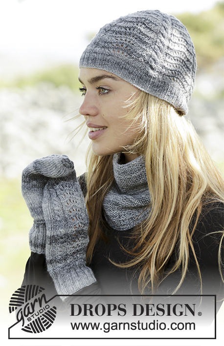 Sea Spray / DROPS Extra 0-1369 - Set consists of: Knitted mittens, hat and neck warmer with cables and wave pattern in DROPS Fabel. Size S - L