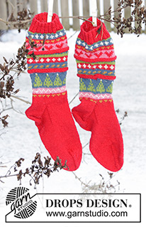 Mistle-Toes / DROPS Extra 0-1397 - Calze di Natale lavorate ai ferri con motivo multicolore. Taglie 35-43. Lavorate in DROPS Karisma.