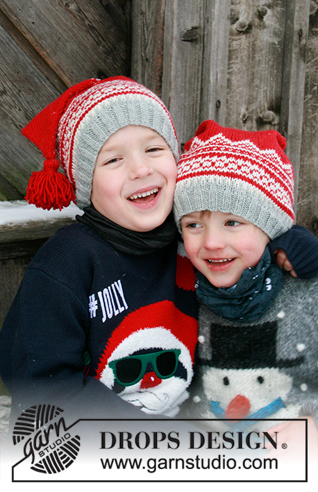 Double Trouble / DROPS Extra 0-1428 - Knitted hat for children in DROPS Merino Extra Fine. The piece is worked with Nordic pattern and tassel. Sizes 2 – 12 years. Theme: Christmas.