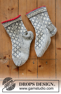 Tip Toe Santa / DROPS Extra 0-1433 - Knitted socks in DROPS Karisma. The piece is worked with Nordic pattern. Sizes 35 - 43. Theme: Christmas.