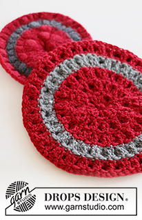 Ho Ho Hot! / DROPS Extra 0-1512 - Crocheted and felted trivet in DROPS Snow. The piece is worked from the middle outwards and with bobbles. Theme: Christmas.