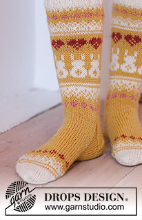 Bunny Love / DROPS Extra 0-1536 - Strikkede sokker i DROPS Karisma. Arbeidet strikkes ovenfra og ned med nordisk mønster, harer og hjerter. Størrelse 35 - 46. Tema: Påske.