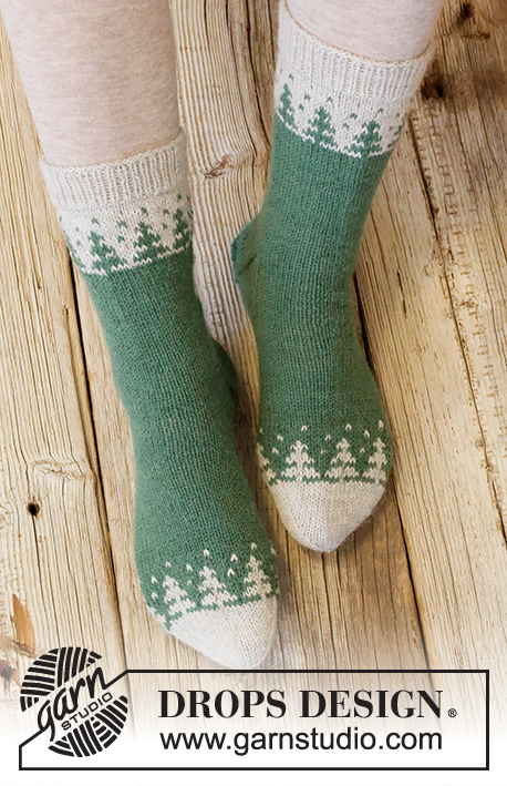 Forest Spell / DROPS Extra 0-1553 - Knitted socks with Nordic pattern in DROPS Nord. Size 35 to 43 Theme: Christmas.