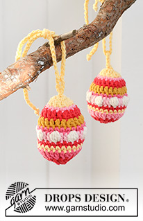 Easter Eggs / DROPS Extra 0-1599 - Gehaakte decoratie-eieren in DROPS Paris. Het werk wordt in de rondte gehaakt van boven naar beneden met bobbels en strepen. Thema: Pasen.