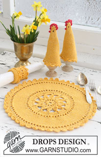 Sunny Morning / DROPS Extra 0-623 - Set comprises: Crochet DROPS place mat, egg warmer and serviette ring in ”Safran” and ”Glitter”.