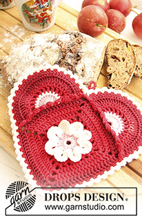 DROPS Extra 0-739 - Crochet pot holder in DROPS Muskat. Piece is worked as a heart with flower. Theme: Christmas
