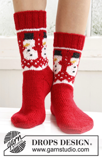 Frosty Feet / DROPS Extra 0-786 - Gebreide DROPS sokken met Kerst patroon van ”Karisma”. Maat 32-43 
