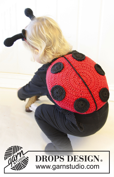 Ladybug in training / DROPS Extra 0-891 - Déguisement coccinelle avec bretelles, crocheté en DROPS Paris.