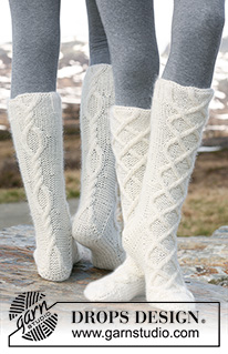 Aran Dance / DROPS 114-6 - Knitted DROPS Socks with cables in ”Merino Extra Fine” and ”Kid-Silk”. 