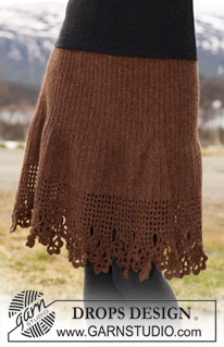 Swiss Chocolate / DROPS 115-40 - DROPS Skirt in ”Classic Alpaca” crochet from side to side with lace border along bottom edge. 
Size S to XXXL
