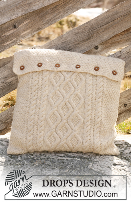 Cabled Hide Away / DROPS 117-50 - Knitted DROPS cushion cover with cables in ”Alaska”. 