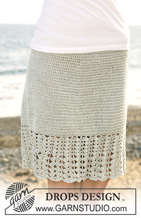 Seaside Comfort / DROPS 118-27 - Crochet DROPS skirt with wide fan patterned border in ”Cotton Viscose”. Size S – XXXL