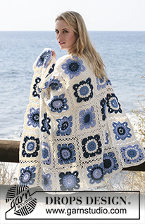 Seaside Blues / DROPS 120-3 - DROPS blanket crochet in squares in ”Karisma”.
