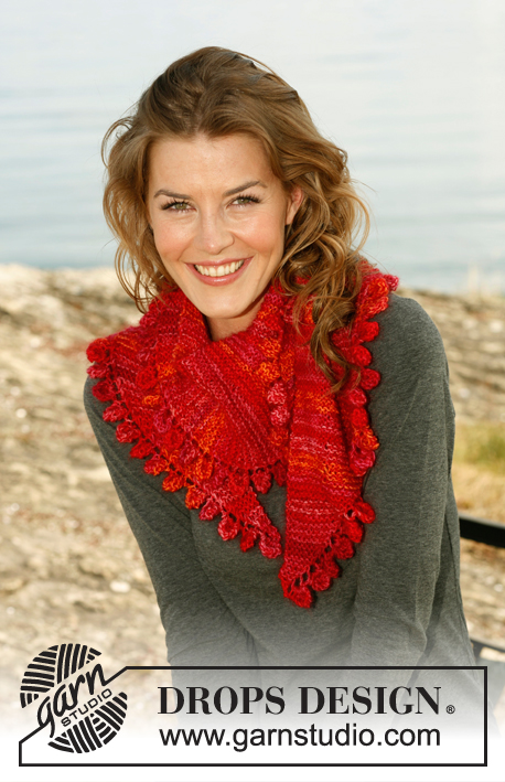 Drops of Fire / DROPS 131-50 - Knitted DROPS scarf in garter st with short rows and bobbles along the edge in ”Fabel” or Flora and ”Kid-Silk”.