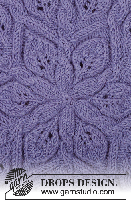 Dancing Leaves / DROPS 165-39 - Set consists of: Knitted DROPS hat with cables and leaf pattern and knitted neck warmer with leaf pattern in ”Merino Extra Fine”.