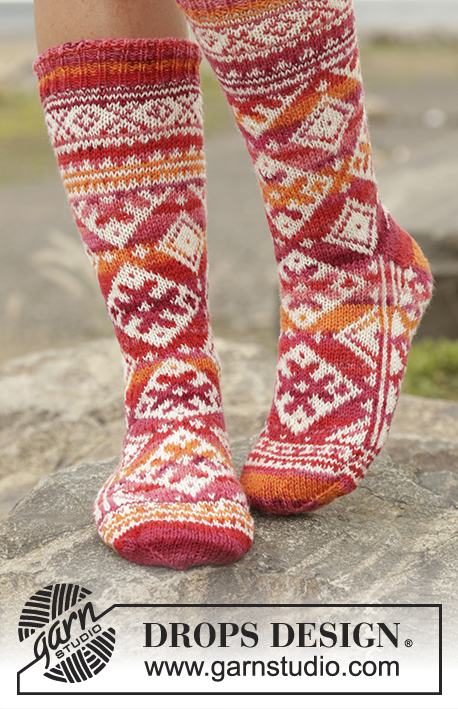 Mexican Sunset / DROPS 170-11 - Strikkede DROPS sokker i ”Fabel” med nordisk mønster, strikket fra tåen og op. Str 35 - 43