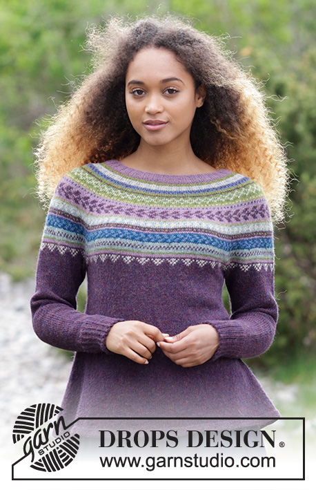 Blueberry Fizz / DROPS 180-7 - The set consists of knitted jumper with round yoke, multi-colored Norwegian pattern and A-shape, worked top down. Sizes S - XXXL. Hat with multi-colored Norwegian pattern.
The set is worked in DROPS Alpaca.