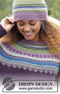 Blueberry Fizz / DROPS 180-7 - The set consists of knitted jumper with round yoke, multi-coloured Norwegian pattern and A-shape, worked top down. Sizes S - XXXL. Hat with multi-coloured Norwegian pattern.
The set is worked in DROPS Alpaca.