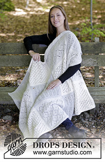 Twelve Clouds / DROPS 181-32 - Knitted blanket with squares in lace pattern.
Piece is knitted in 2 strands DROPS Alpaca.