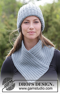 Warm Snap / DROPS 182-17 - The set consists of: Knitted hipster hat, neck warmer and wrist warmers with textured pattern.
The set is knitted in DROPS Nepal.