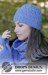 Stay Warm / DROPS 182-20 - The set consists of: Knitted hat, neck warmer and wrist warmers with lace pattern. Sizes S/M – M/L.
The piece is worked in DROPS Lima.