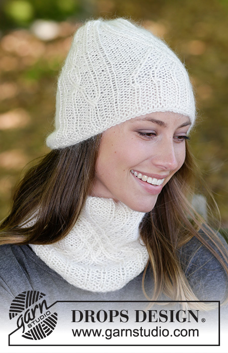 Atlantic / DROPS 182-25 - The set consists of: Knitted hat and neck warmer with cables and rib, worked top down. Sizes S/M – L/XL.
The piece is worked in DROPS BabyAlpaca Silk and DROPS Kid-Silk.