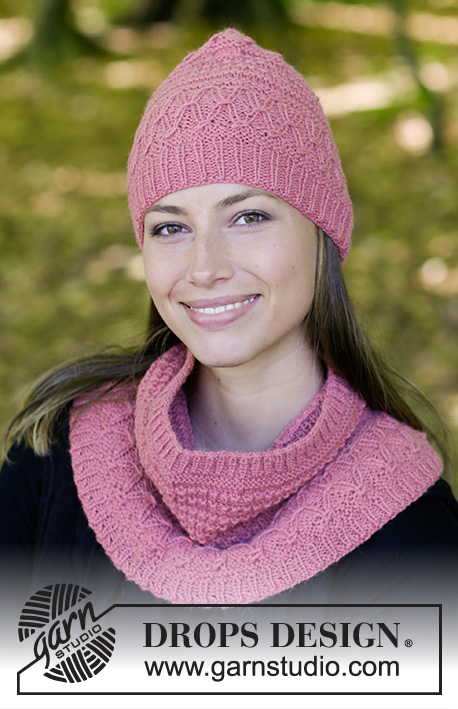 Raspberry Truffle / DROPS 182-8 - The set consists of: Hat and neck warmer with textured pattern, worked top down. Sizes S – L. 
The set is worked in DROPS Puna or Sky.