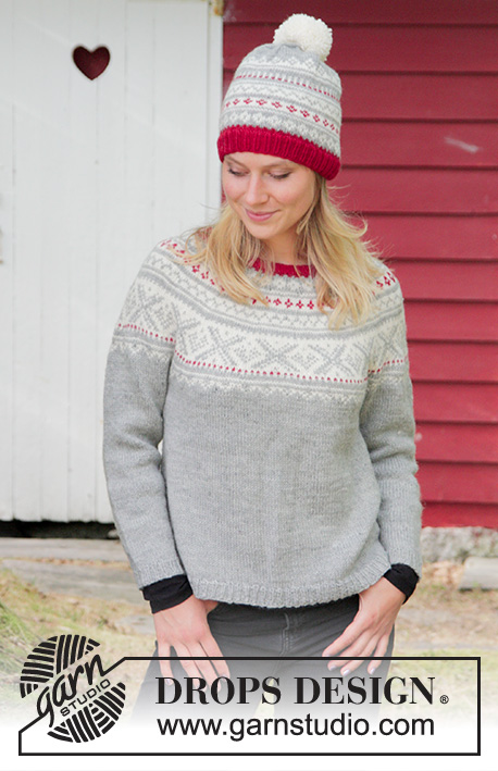 Narvik / DROPS 183-2 - The set consists of: Knitted sweater with round yoke, multi-colored Nordic pattern and A-shape, worked top down. Sizes S - XXXL. Hat with multi-colored Nordic pattern and pom pom.
The set is worked in DROPS Karisma.