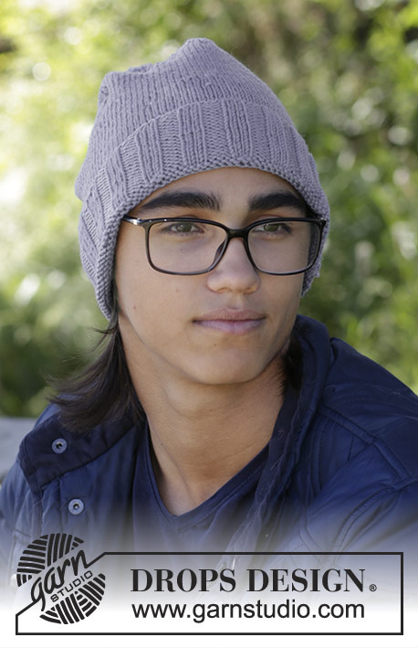 Limingen / DROPS 185-23 - Knitted hat with pompom for men.
Piece is knitted in DROPS Merino Extra Fine.