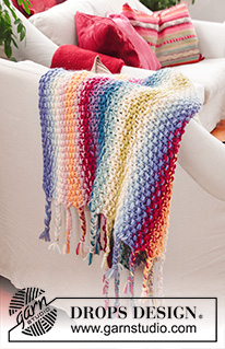 Jalisco / DROPS 189-1 - Knitted rainbow blanket with moss stitch, stripes and fringe. The piece is worked in 2 strands DROPS Snow.