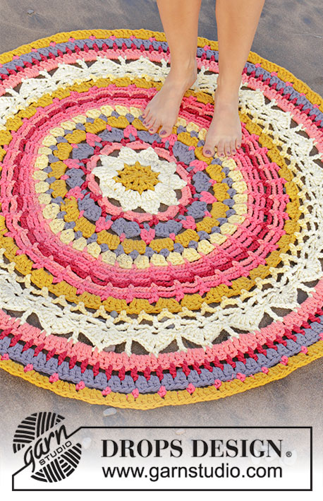 Himalaya Rose / DROPS 189-10 - Carpet with lace pattern and stripes, crocheted in the round in a circle from centre and outwards. Piece is crocheted in 3 strands DROPS Paris.
