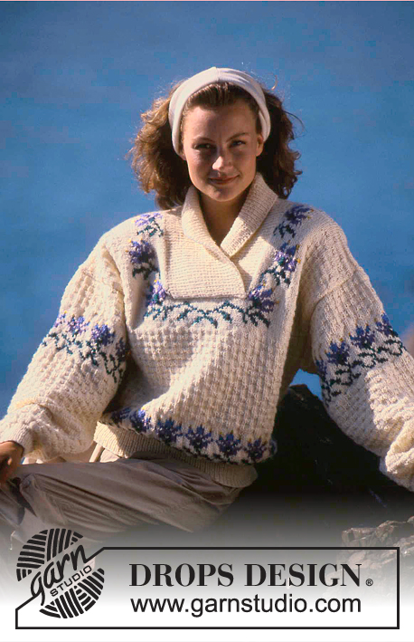 DROPS 19-20 - Sweter na drutach, z żakardem w kwiaty i ściegiem strukturalnym, z włóczki DROPS Karisma. Od S do L.